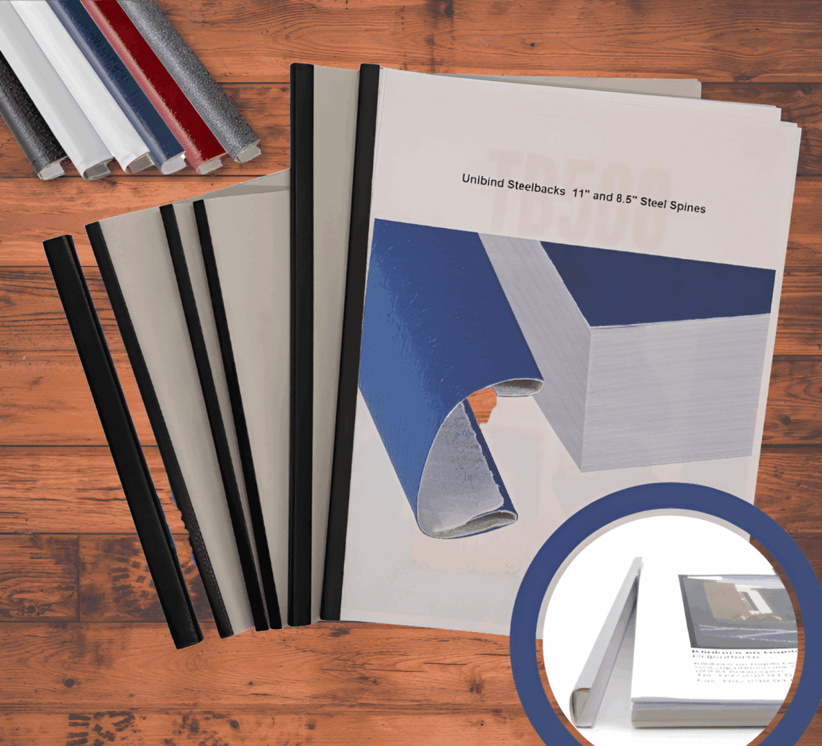 Binding spines and cover sheets on table.