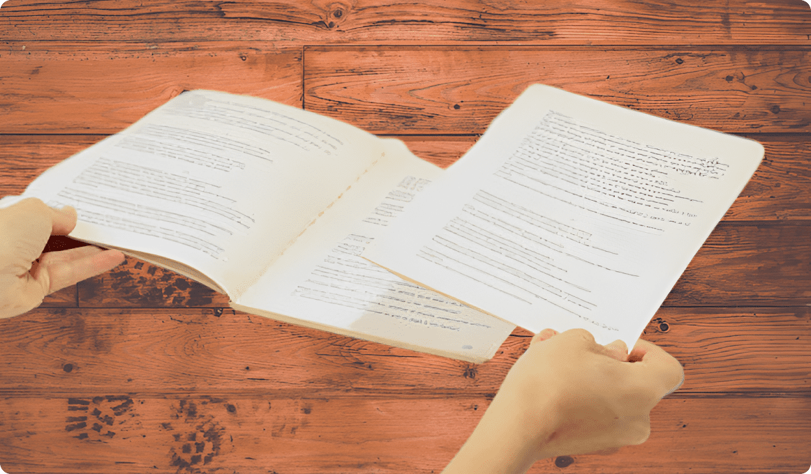 Hands holding open folder with documents.